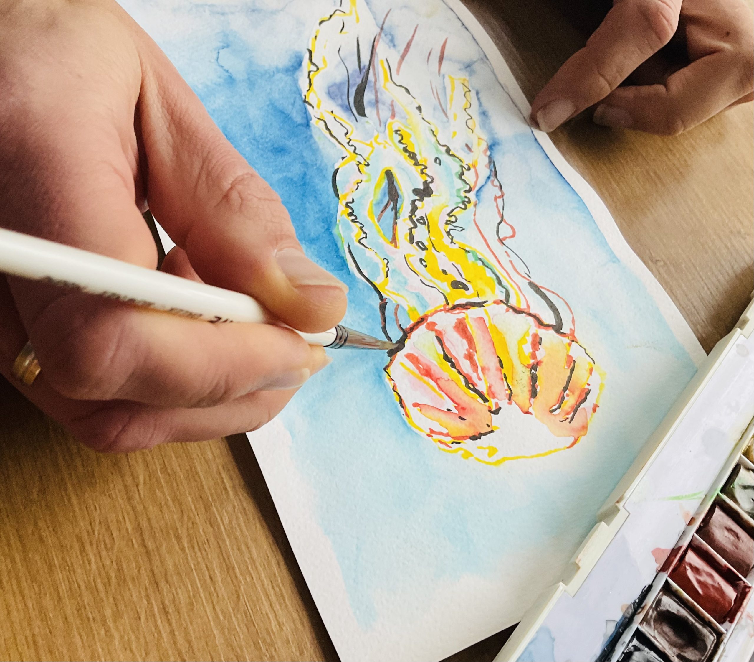 dessin de méduse à l'aquarelle en train d'être finalisé